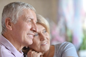 Elderly couple embracing after Cataract Surgery